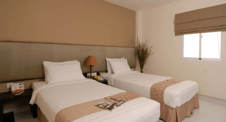 Hình ảnh phòng nghỉ 2 giường đơn tại nhà nghỉ Holiday Sài Gòn Hình ảnh phòng nghỉ 2 giường đơn tại nhà nghỉ Holiday Sài Gòn