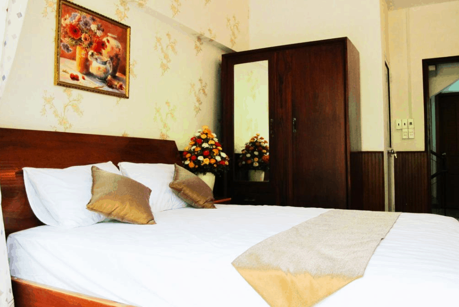 Phòng nghỉ 1 giường lớn tại nhà nghỉ Anh Đào Guesthouse Phòng nghỉ 1 giường lớn tại nhà nghỉ Anh Đào Guesthouse