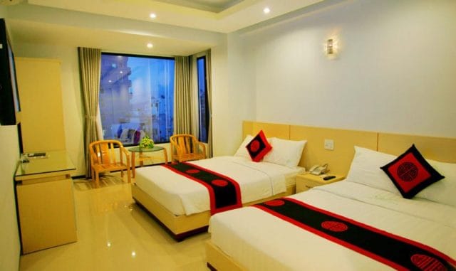 Phòng ngủ đơn giản tinh tế trong khách sạn (Ảnh ST)
