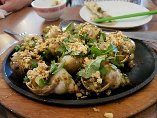 Món ốc nướng mỡ hành thơm lừng (Ảnh ST)