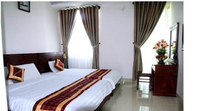 Căn phòng màu trắng trang nhã của khách sạn Minh Đăng (ảnh ST) Căn phòng màu trắng trang nhã của khách sạn Minh Đăng (ảnh ST)